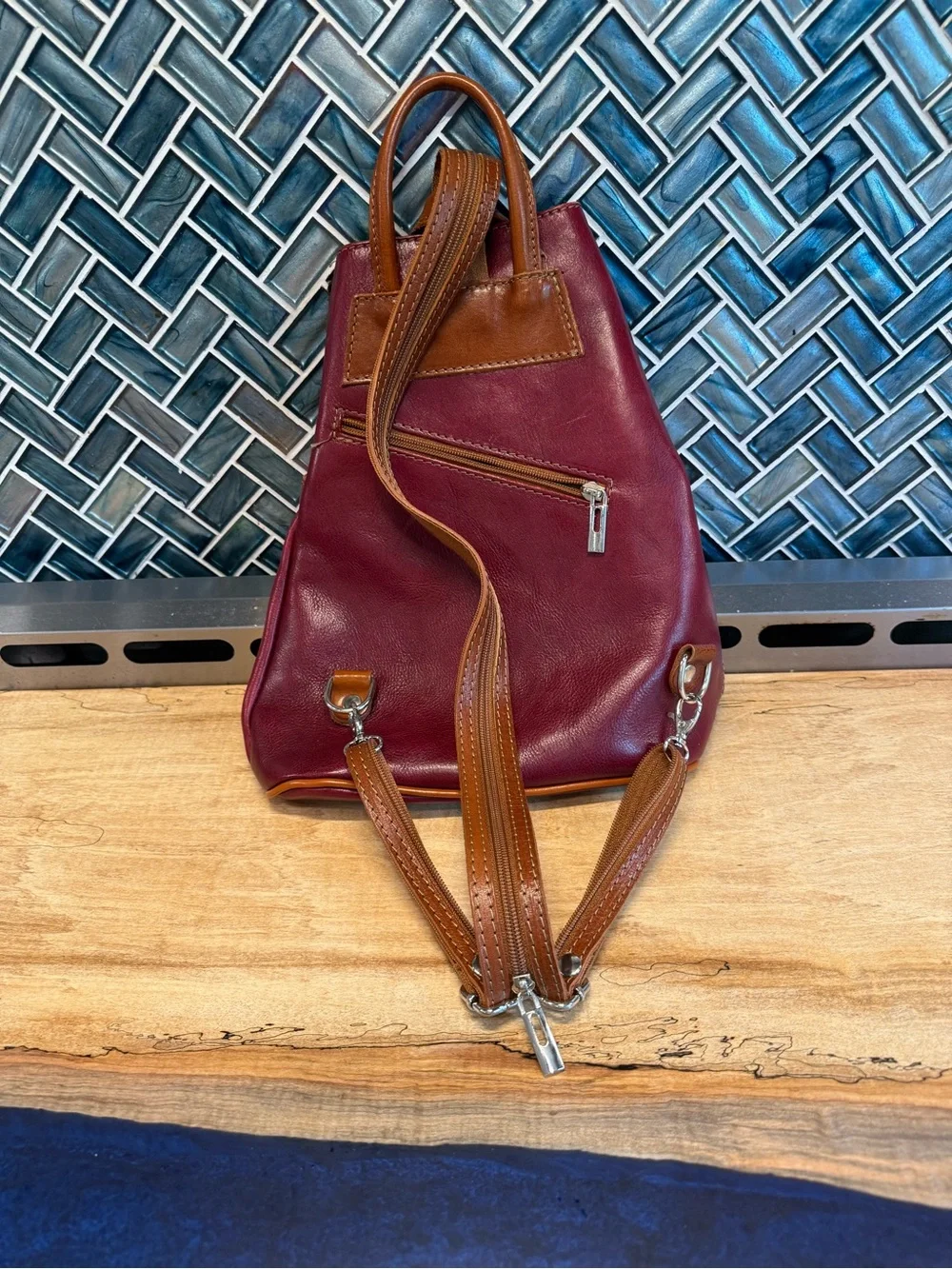 Leather Convertible Sling/Backpack in Burgundy with Tan Strap